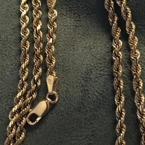 Beautiful 14K solid heavy diamond cut rope chain. 22 inches. 2mm, 16 grams